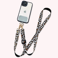 bandoulière pour téléphone en tissu motif léopard sur fond blanc réglable avec patch de fixation universel pour téléphone